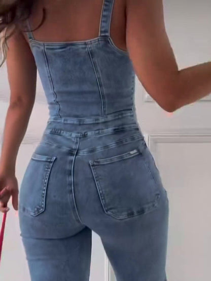 Carmine Juneberry DenimDare sleeveless paneled denim jumpsuit with edgy, feminine style, featuring a fitted waist and wide-leg pants.