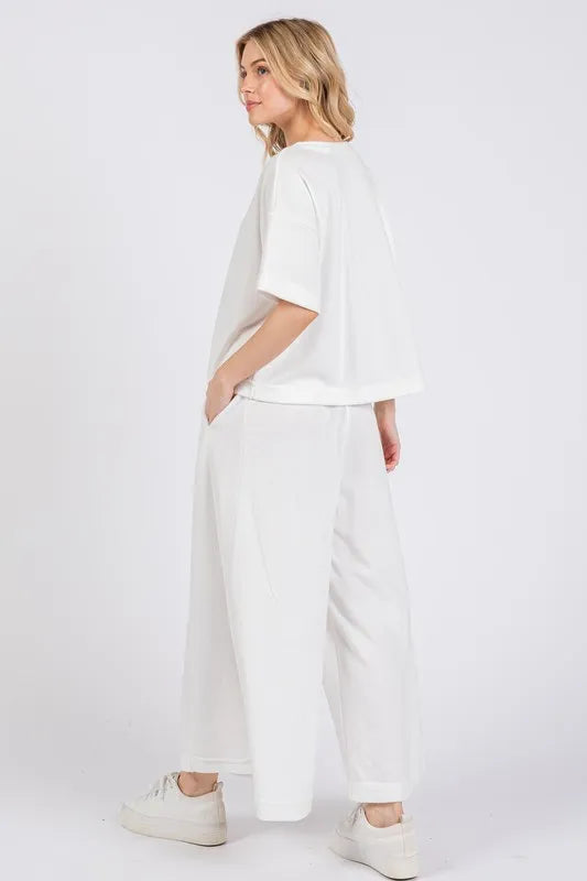 Pear Daisy Ces Femme half-button top and matching pants set, stylish home loungewear, with half sleeves and comfortable fit.