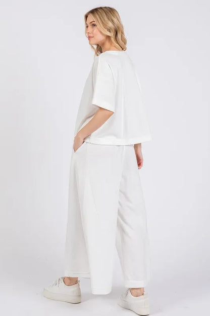 Pear Daisy Ces Femme half-button top and matching pants set, stylish home loungewear, with half sleeves and comfortable fit.