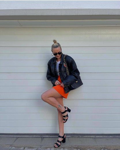 Bright yellow high waist mini skirt for women, stylish summer Carmine Juneberry skirt with a casual fit and short length.