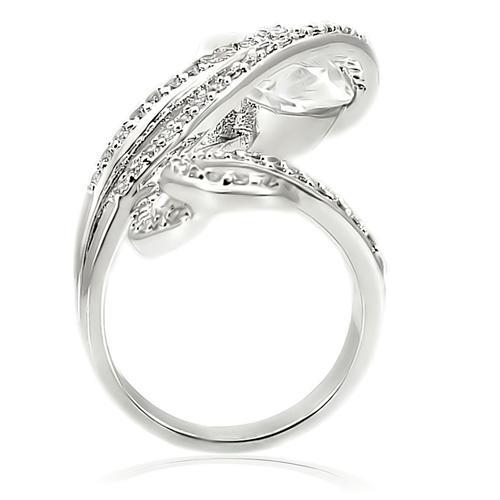 Rhodium brass ring by Turquoise Tiger with AAA grade clear CZ gemstone, featuring a polished band and intricate design.