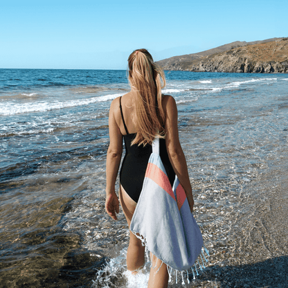 Neon mint and lime 2-in-1 Hammam towel bag made from recycled cotton, by Copper Amymone, featuring vibrant colors and woven texture.