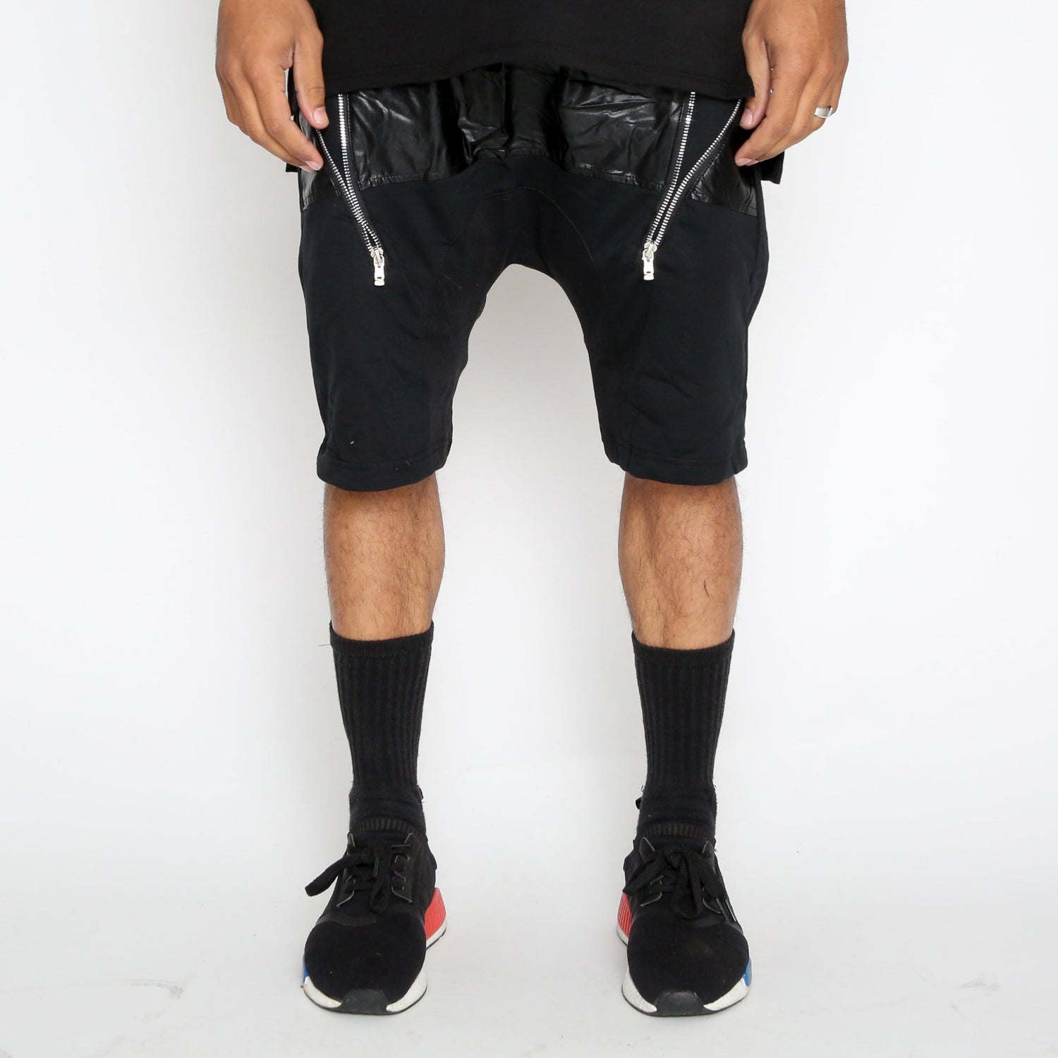Leather front moto shorts by Lime Milo with sleek design and stitched detailing, perfect for stylish casual wear.