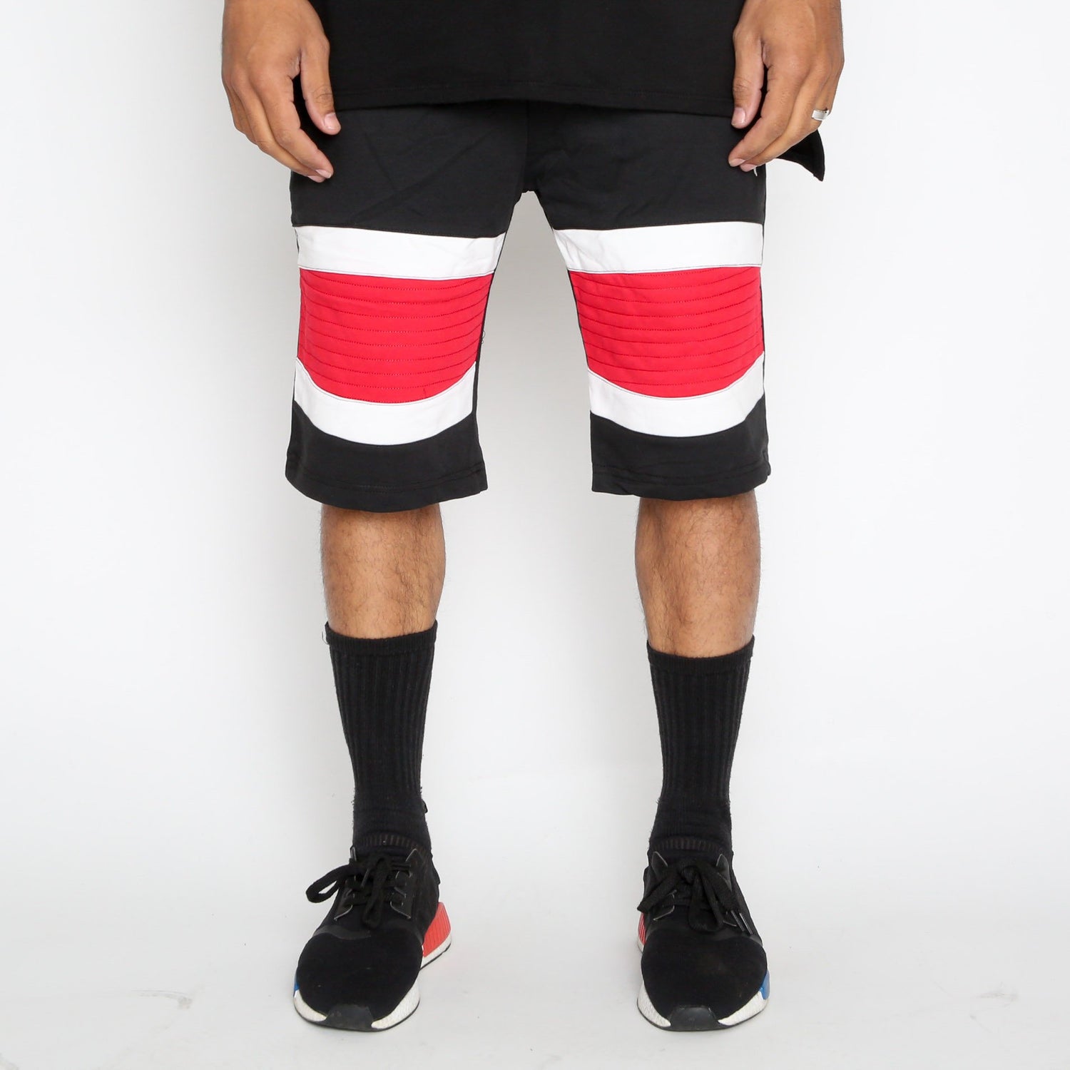 Red Stripe Moto Shorts by Lime Milo, casual shorts with bold red and white striped design, displayed on a neutral background.