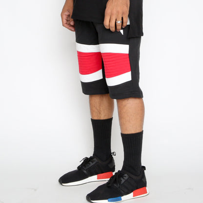Red Stripe Moto Shorts by Lime Milo featuring a stylish design, casual fit, and vibrant red and white stripe pattern.