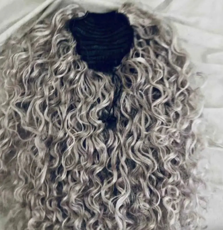 Salt and pepper human hair drawstring ponytail wig by Peach Clymene, featuring natural-looking 100% premium hair and adjustable styling.