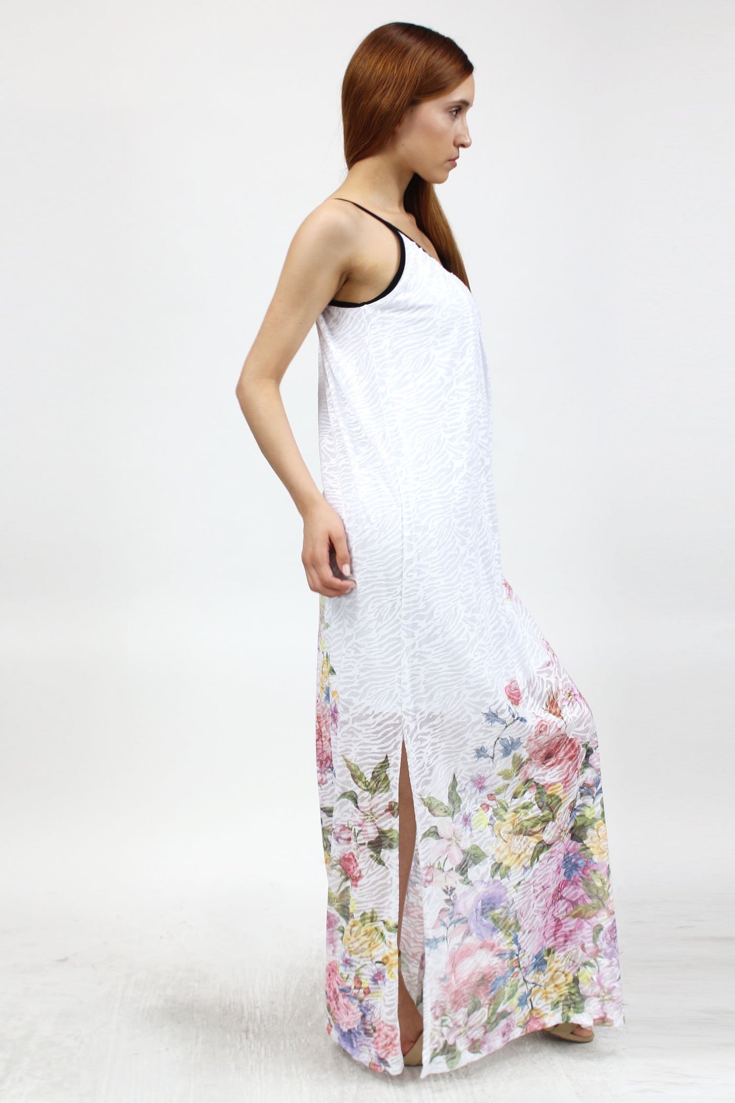 Yellow Hera flower print long dress with side slit, lightweight clothing featuring a vibrant floral pattern and flowing fabric.