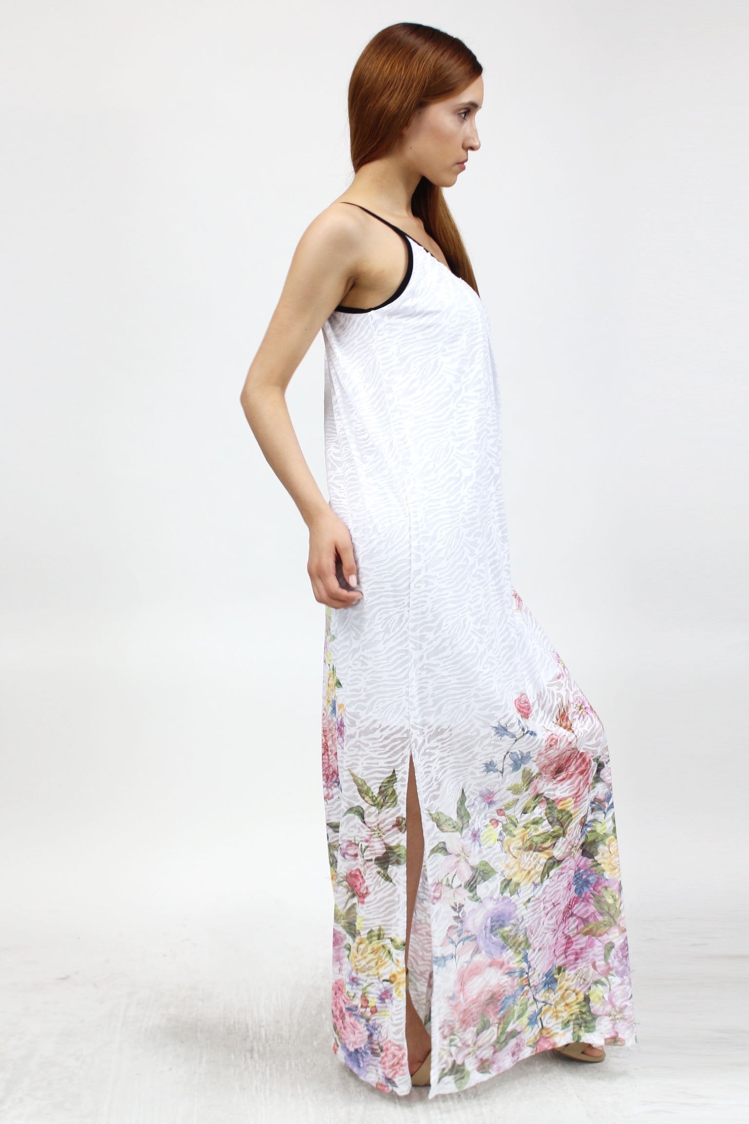 Yellow Hera flower print long dress with side slit, lightweight clothing featuring a vibrant floral pattern and flowing fabric.
