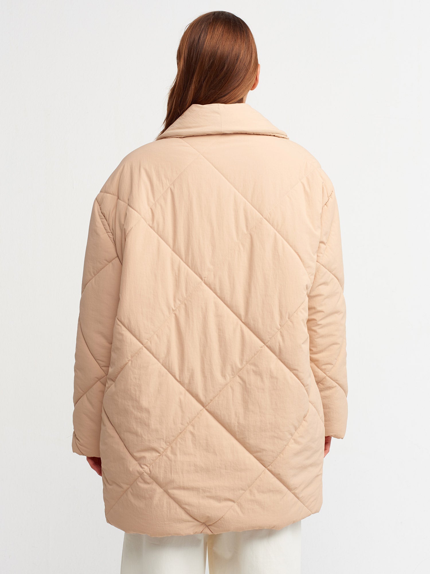 Beige quilted women&