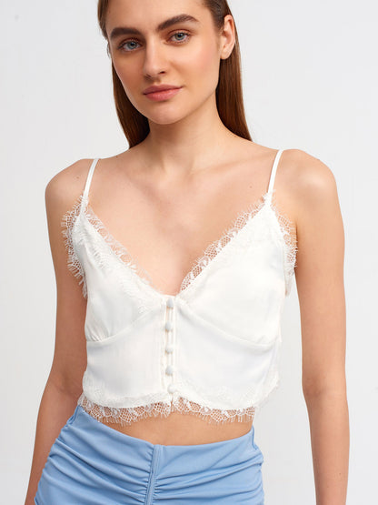 Lace detailed crop top for women by Ruby Dionysus, featuring intricate lace design and fitted style.