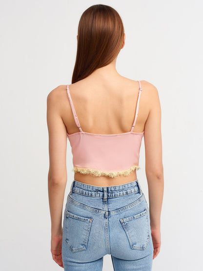 Pink lace detailed crop top for women by Ruby Dionysus, featuring intricate lace design and fitted style.