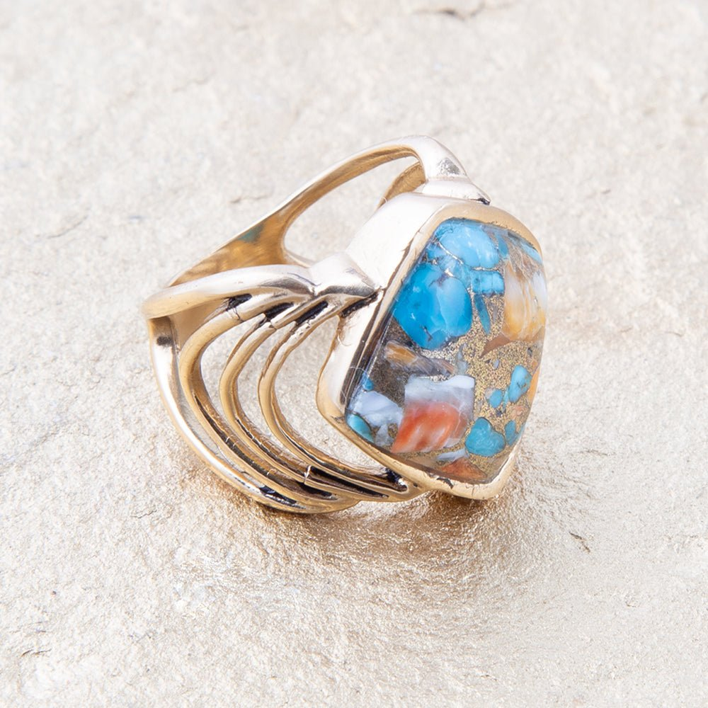 Blue turquoise and orange spiny oyster matrix gold ring, handcrafted jewelry featuring vibrant gemstone in a detailed setting.