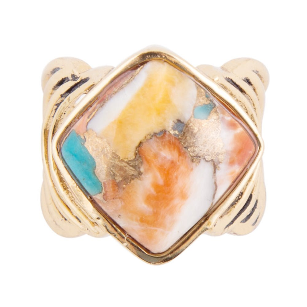 Blue turquoise and orange spiny oyster matrix gold ring featuring intricate jewelry design with vibrant colors and detailed craftsmanship.