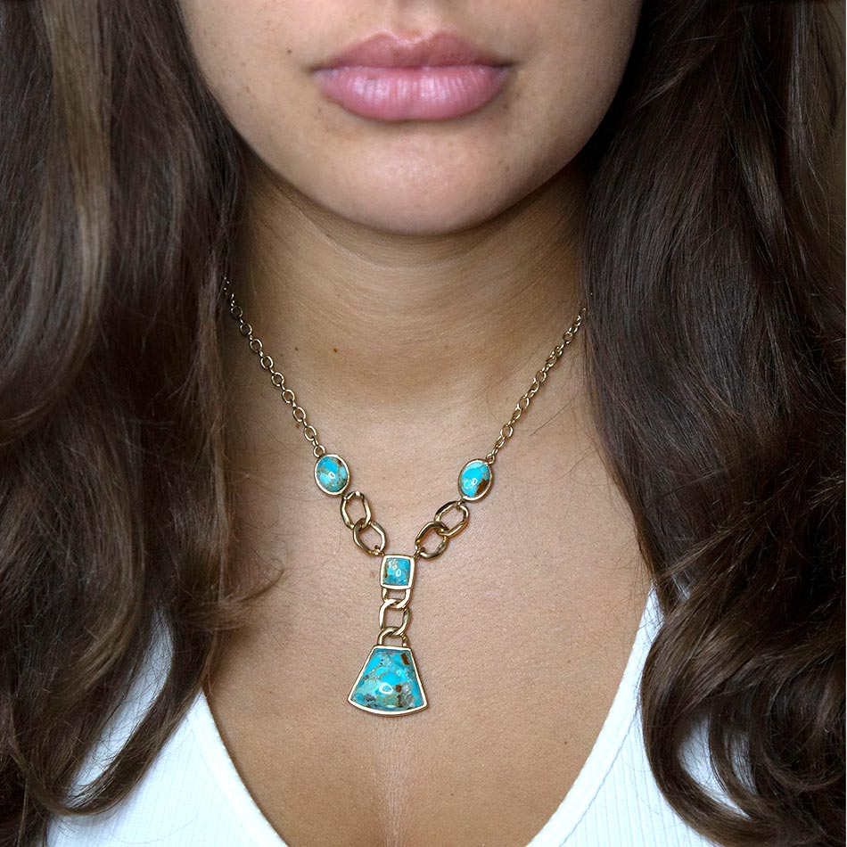 Start2Finish Athena Blue Turquoise and Gold Y-neck necklace with a sleek design and vibrant turquoise pendant.