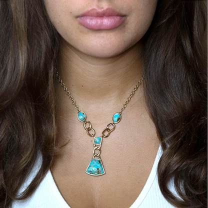 Start2Finish Athena Blue Turquoise and Gold Y-neck necklace with a sleek design and vibrant turquoise pendant.