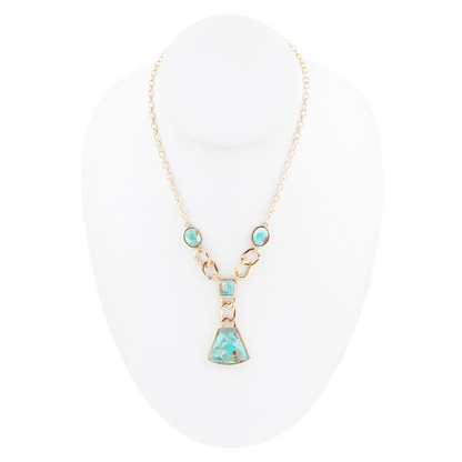 Athena blue turquoise and gold Y-neck necklace by Start2Finish, featuring a stylish jewelry design with vibrant turquoise stones.