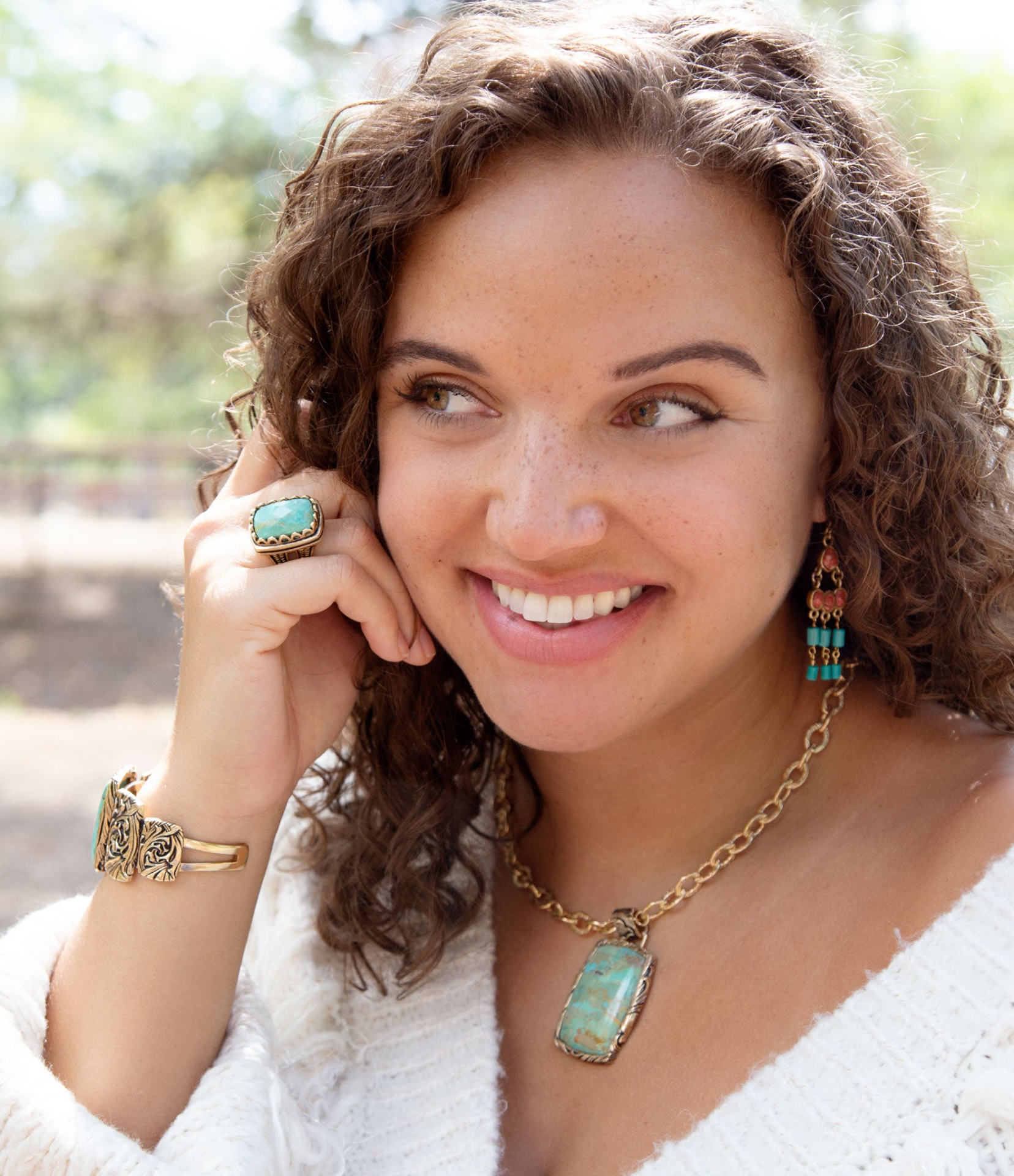 Start2Finish jewelry featuring a blue turquoise and golden cocktail ring with intricate design and polished finish.