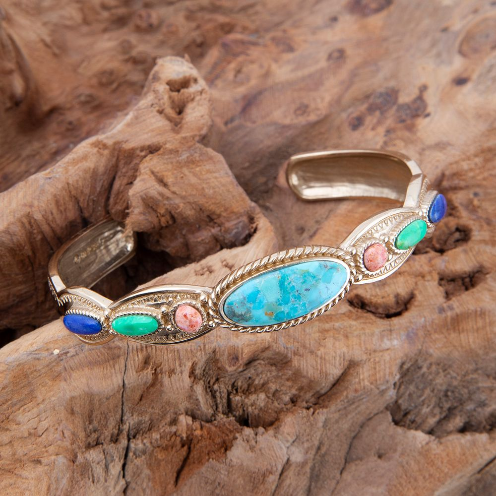 Colorful golden cuff bracelet from Start2Finish featuring concho accents and vibrant jewelry design.
