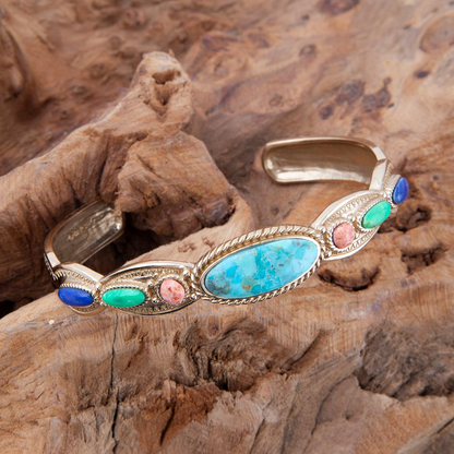Colorful golden cuff bracelet from Start2Finish featuring concho accents and vibrant jewelry design.
