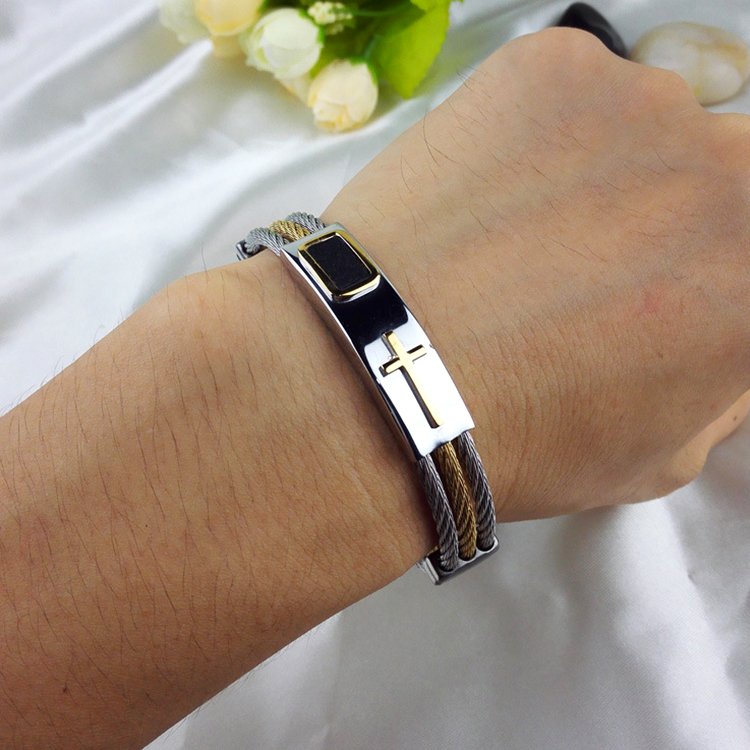 Fuchsia Molly titanium wire bracelet with sleek, minimalist design, featuring smooth, polished metal strands for a modern look.