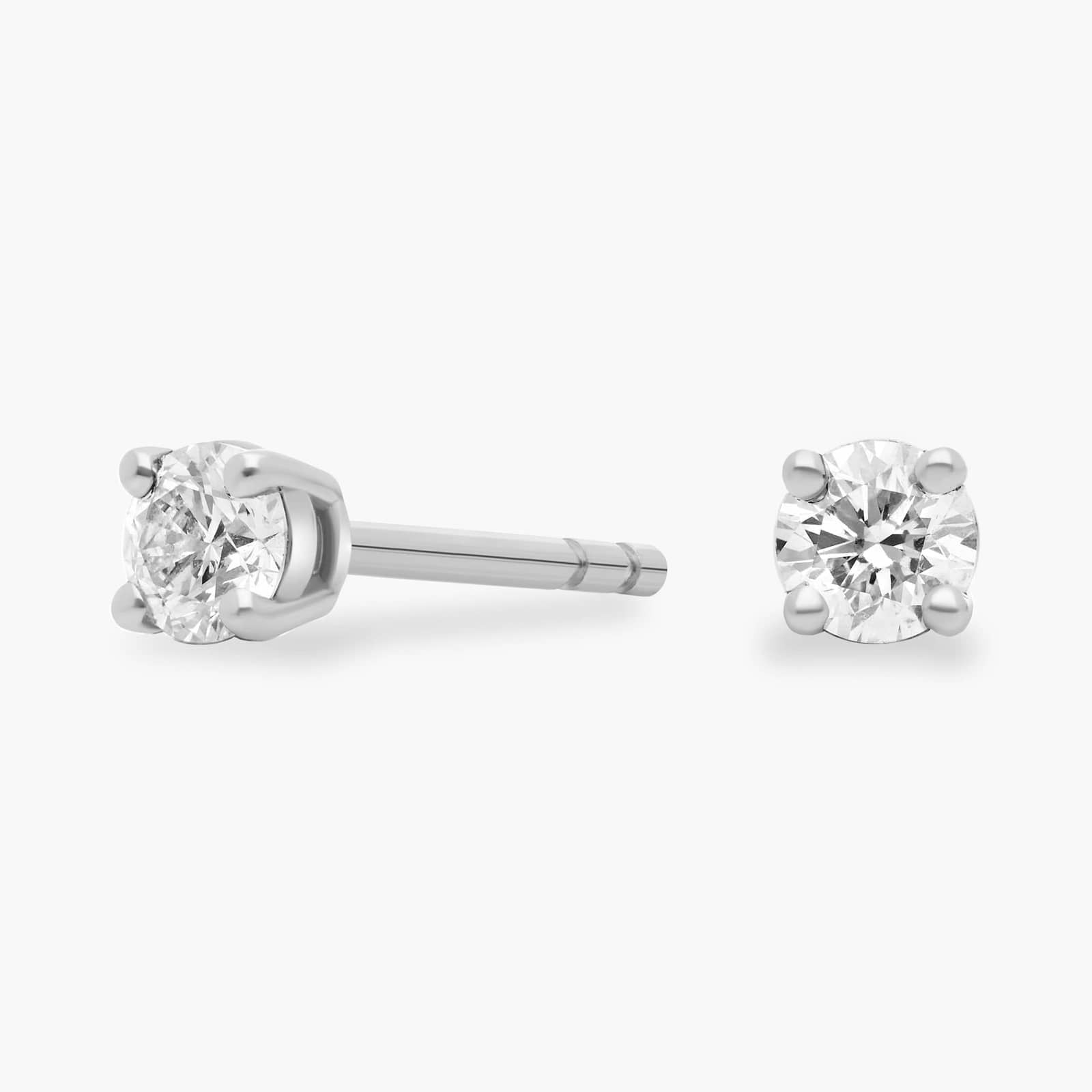 Start2Finish classic diamond stud earrings with 1/4 ct. tw., VS+ clarity, set in 14k white or yellow gold over sterling silver.