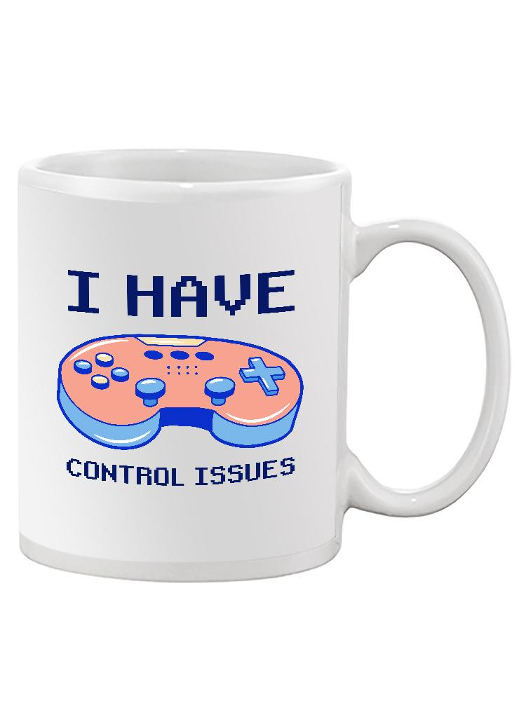 White ceramic mug with "I Have Control Issues" printed in black, displayed on a wooden surface.
