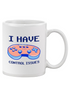 White ceramic mug with "I Have Control Issues" printed in black, displayed on a wooden surface.