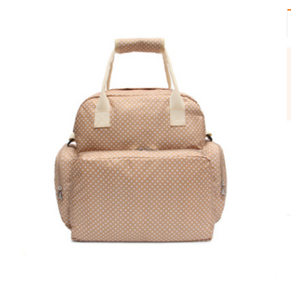 Maroon Asteria diaper mommy bag for travel, with multiple compartments and handles, designed for parenthood and baby accessories.
