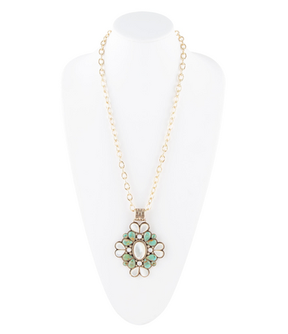 Barcelona blue turquoise and mother of pearl statement necklace by Start2Finish featuring gold accents and intricate jewelry design.