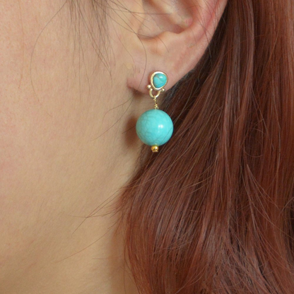 Blue turquoise and gold drop post earrings from Start2Finish jewelry featuring vibrant blue stones and elegant gold accents.