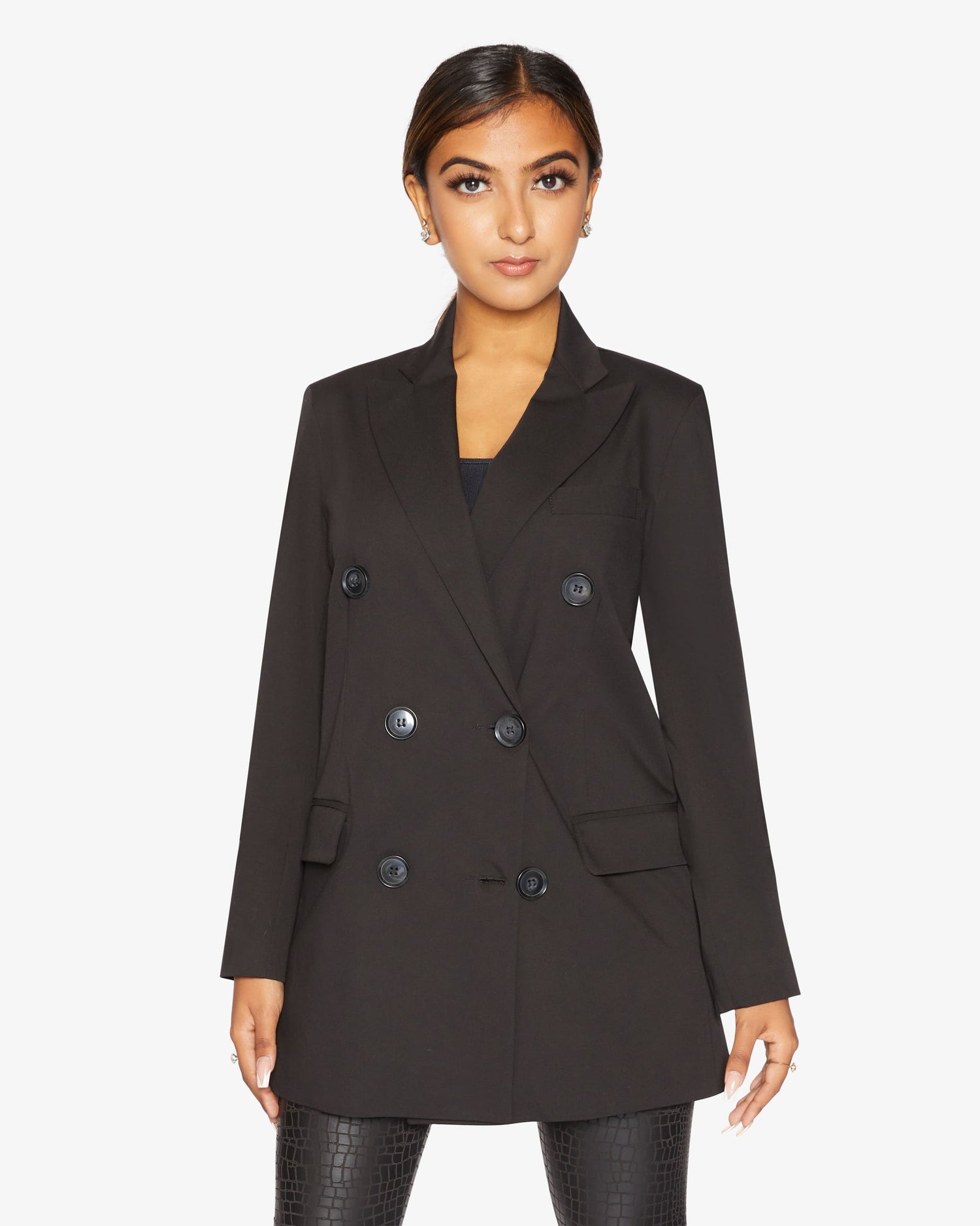 Black Jenna double-breasted blazer by Rose Eleusis, tailored fit with lapel collar and button detail, displayed on a hanger.