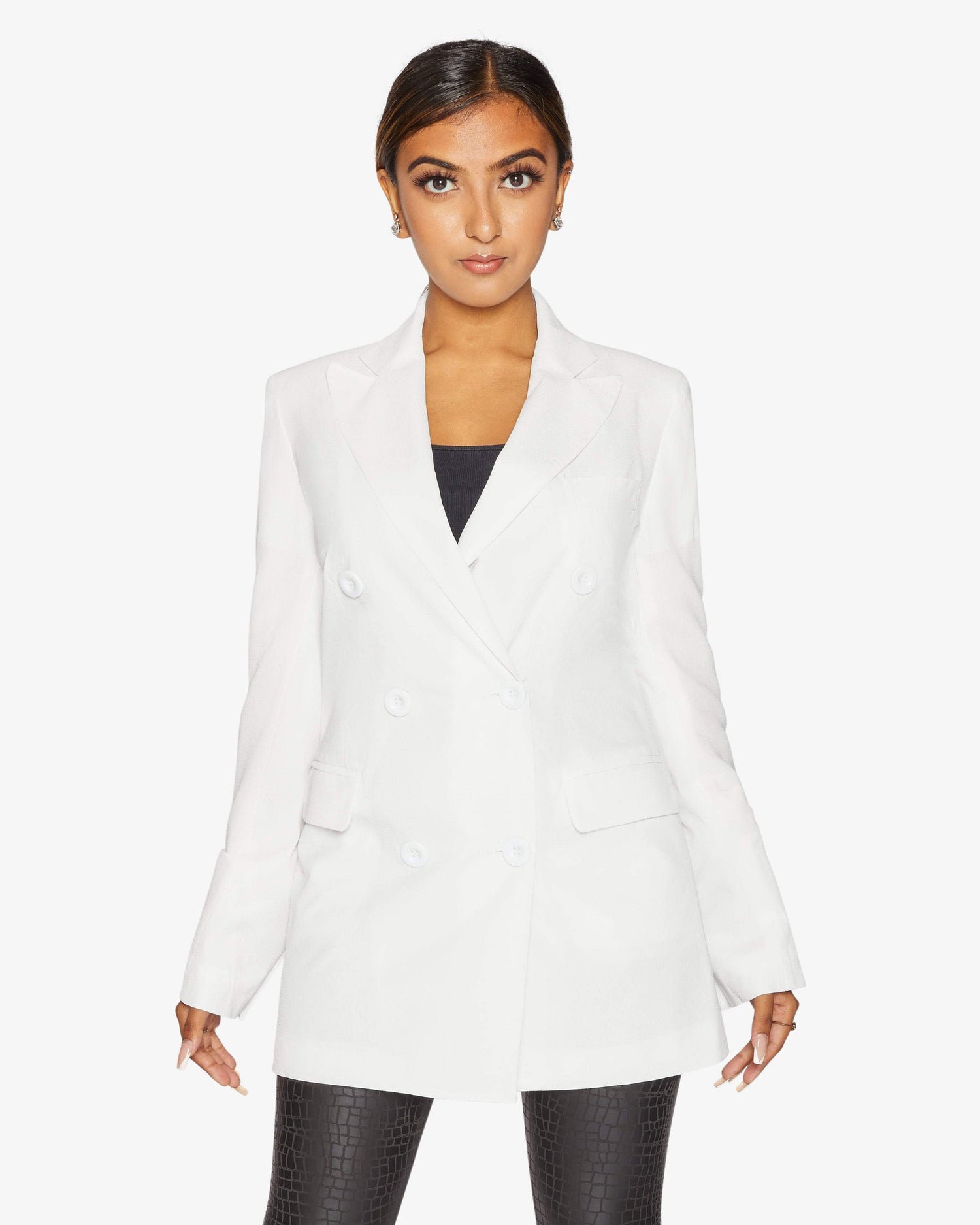 White Jenna double-breasted blazer by Rose Eleusis, tailored jacket with classic lapels and structured fit, shown on a model.