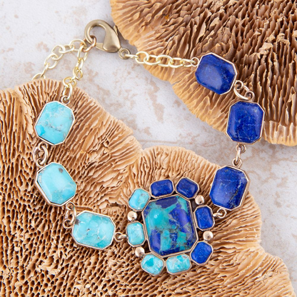 Start2Finish Duality blue lapis and turquoise golden bracelet featuring vibrant blue stones and gold accents in a jewelry image.