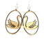 Red Sunflower Swan in Oval earrings featuring elegant, silver-tone jewelry with oval-shaped swan charms.
