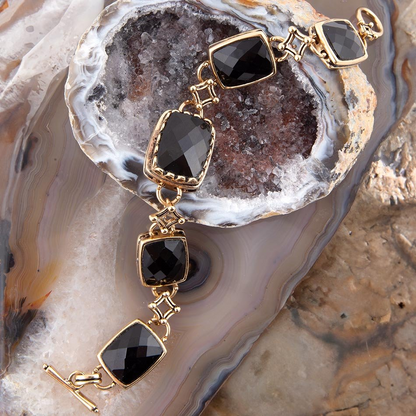Black Onyx Golden Link Bracelet from Start2Finish featuring glossy black onyx stones and gold-toned link chain jewelry.