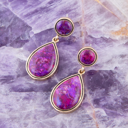 Purple turquoise and golden bronze teardrop earrings with intricate jewelry design, showcasing elegant craftsmanship.