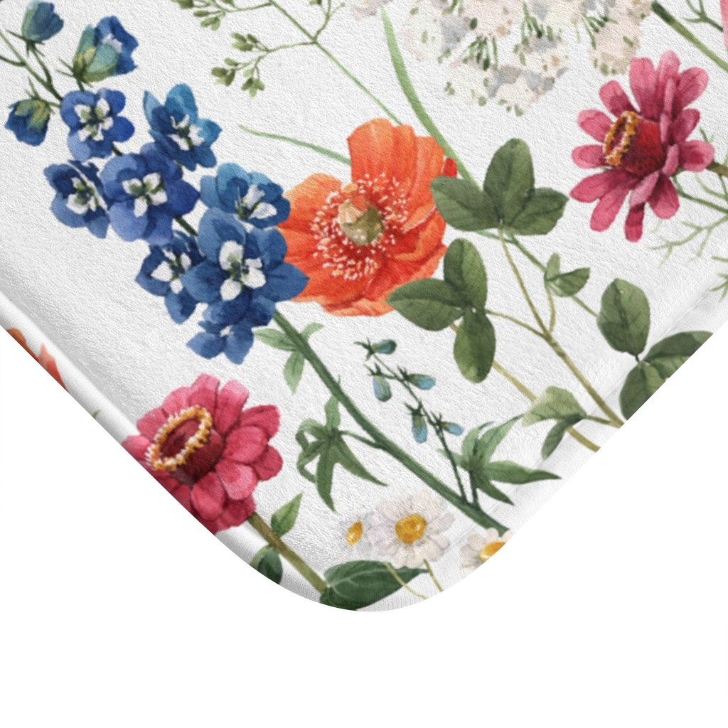 Spring floral garden bath mat by Yellow Pandora featuring colorful floral patterns for bathroom decor.