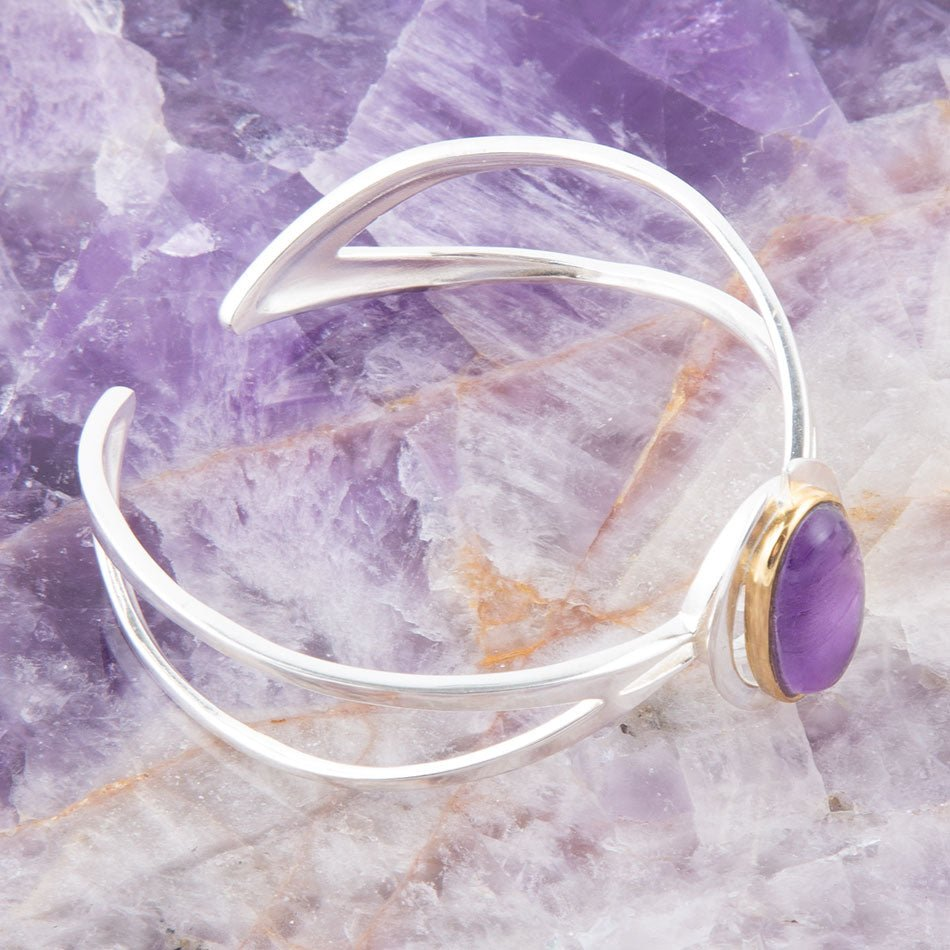 Shine Bright Amethyst cuff bracelet by Start2Finish featuring polished purple amethyst stones and a silver-toned metal band.