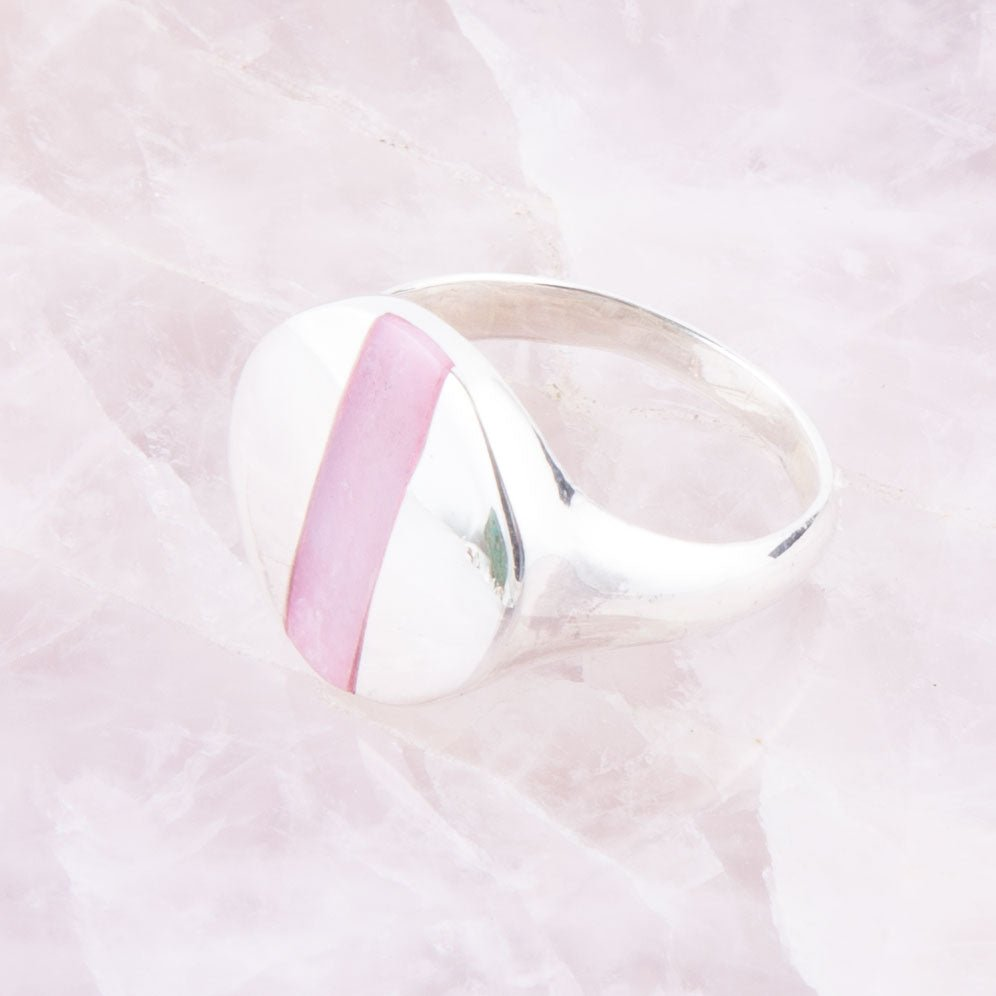Pink opal and sterling silver circle ring from Start2Finish jewelry featuring a polished pink opal gemstone in a sleek silver band