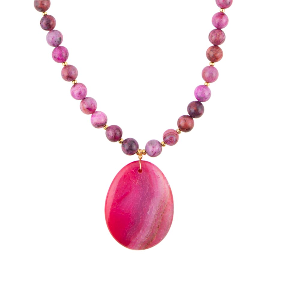 Pink magenta agate slab pendant necklace featuring a polished, natural stone with silver bail on a delicate chain.