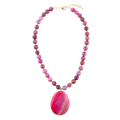 Pink magenta agate slab pendant necklace with natural stone and silver chain, jewelry piece showcasing vibrant stone details