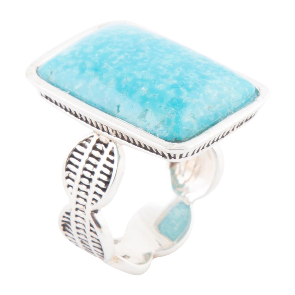 Start2Finish Zion blue turquoise and sterling silver jewelry ring with a polished, oval turquoise stone and intricate silver band design.
