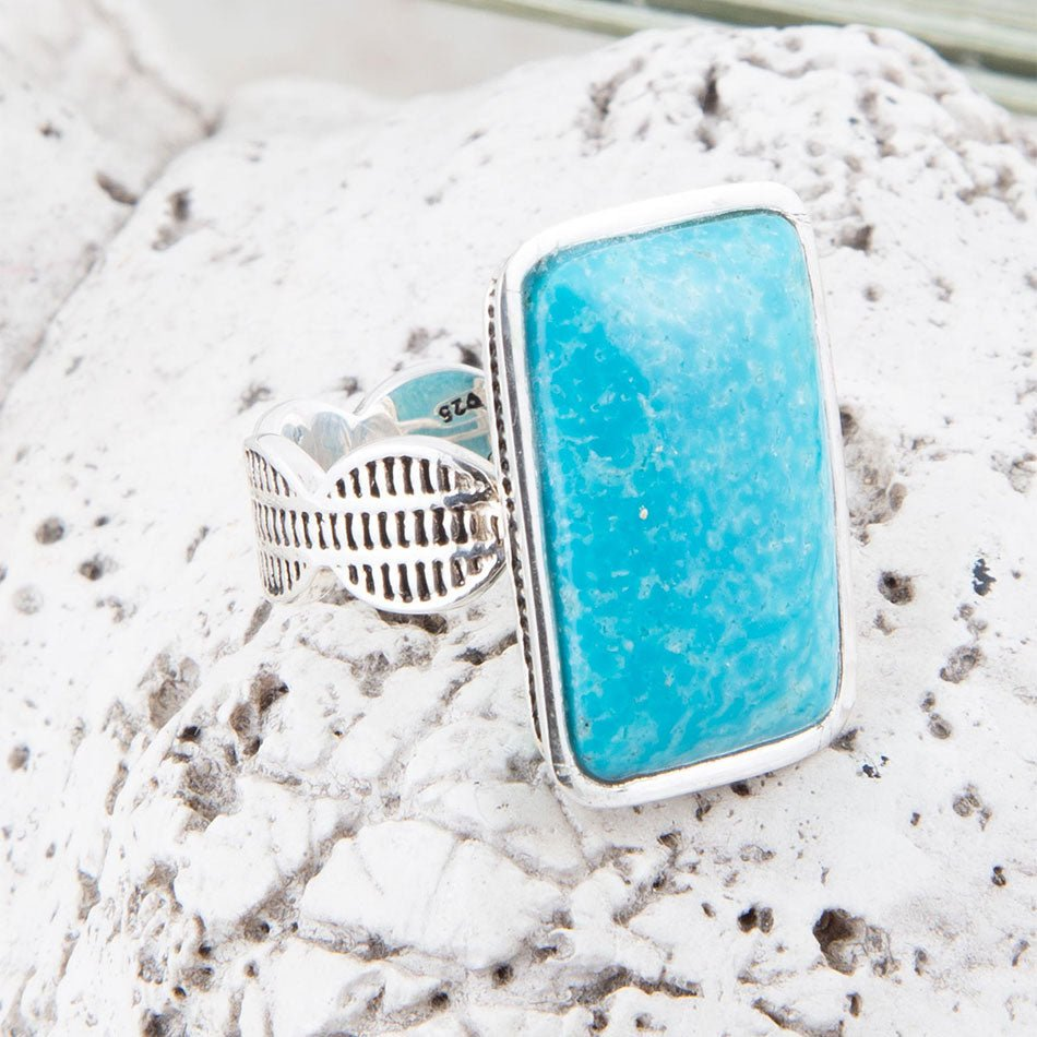 Start2Finish Zion blue turquoise and sterling silver ring, showcasing a vibrant turquoise gemstone set in a detailed silver band.
