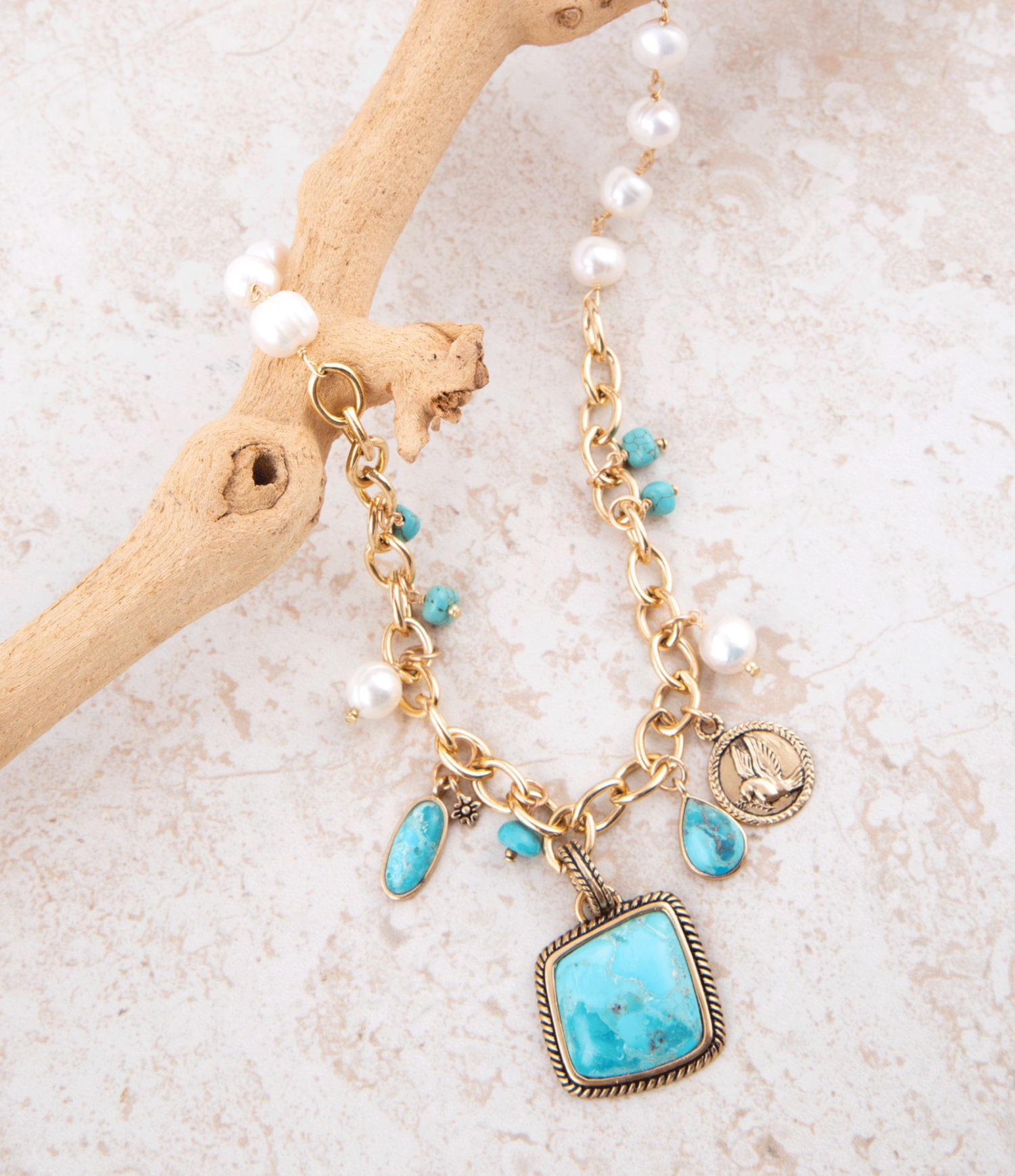Blue turquoise and white pearl multi-pendant gold necklace with intricate jewelry design by Start2Finish.
