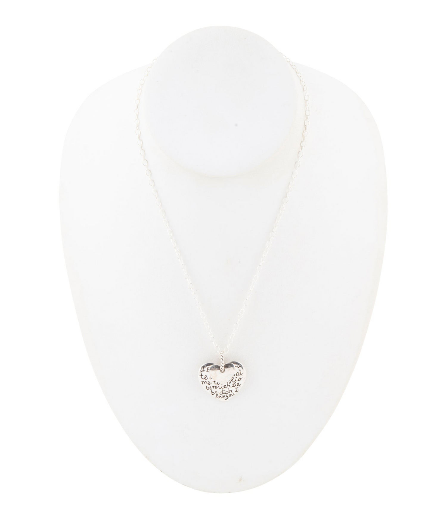 Sterling silver engraved heart pendant necklace with intricate detailing, jewelry piece featuring a polished heart charm.