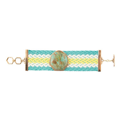 Blue Turquoise Textile Blues woven bracelet from Start2Finish featuring intricate woven fabric and vibrant turquoise color.