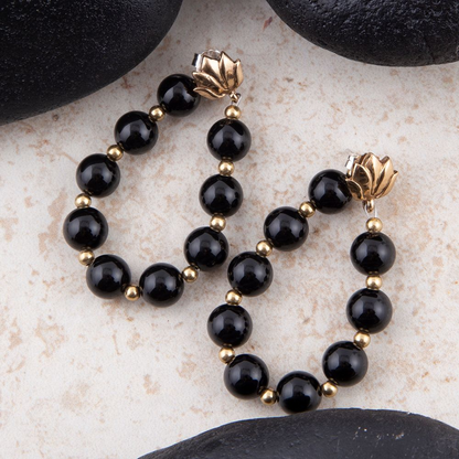 Start2Finish Carly Black Onyx gold loop earrings, gold post jewelry featuring black onyx stones and complete hoop design.