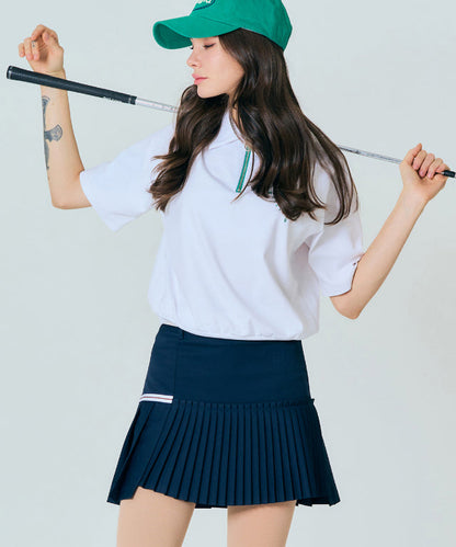 Amethyst Lucy BENECIA 12 navy asymmetric culottes with wide legs and pleated fabric, styled as fashionable accessories.