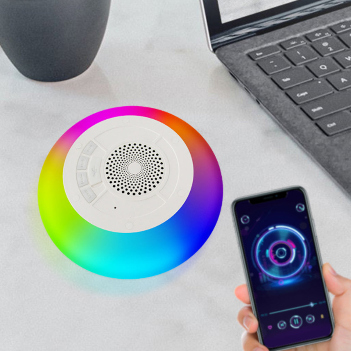 Salmon Lucky Floatilla Bluetooth waterproof speaker with LED lights, floating in a pool, ideal for pool parties and outdoor music.