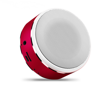 Maroon Asteria portable Bluetooth mini speaker with built-in battery, compact design, and audio controls visible on the device.